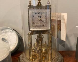 Kundo Brass Torsion Mantle Clock with Glass Dome
