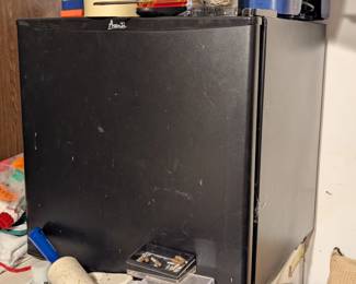 Small fridge with smaller freezer inside. 8 cuft freezer beneath it