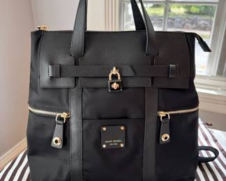 Like New Henri Bendel leather & nylon backpack with dust bag