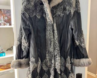 Vintage mink/sheep/snake skin coat in excellent vintage condition!