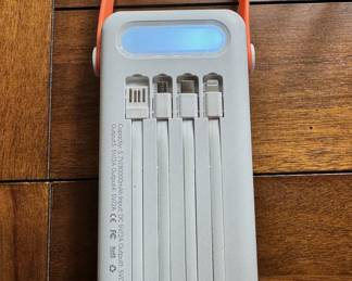 Like New Letscom 30000mAh solar powered bank with integrated cables and light