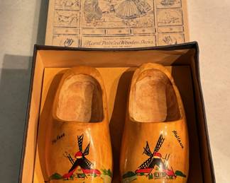 Vintage child’s size wood shoes from Holland in original box. There are several pairs of vintage Dutch wood shoes in various sizes