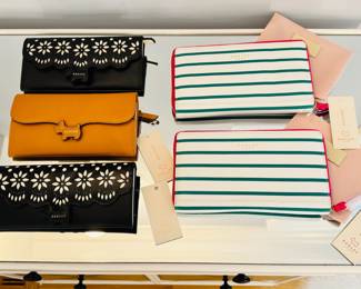 Four New With Tags and one New Without Tags Radley London wallets.