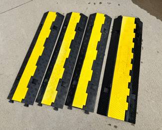 Three Vevor two-cord cable ramps and one three-cord cable ramp