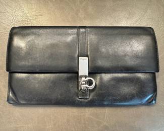 Vintage Salvatore Ferragamo black leather wallet with the iconic Gancini clasp