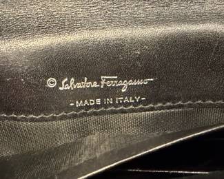 Vintage Salvatore Ferragamo black leather wallet with the iconic Gancini clasp