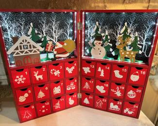 Fun and cute wood advent calendar with individual daily boxes, and it lights up!