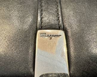 Vintage Salvatore Ferragamo black leather wallet with the iconic Gancini clasp