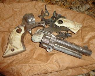 All the parts to this cap gun - can you put it back together?