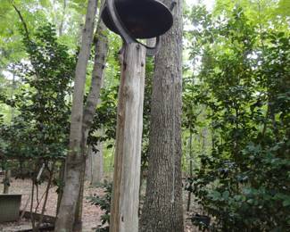 Large Cast Iron Dinner Bell (to buy you will need a saw to cut the pole at the ground)
