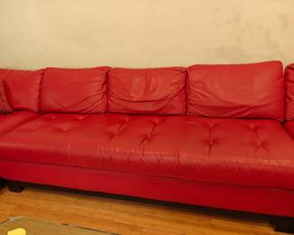 203	Armless Red Leather Couch	78x34x34