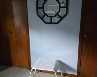 Octagonal mirror and small bench