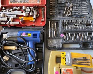 Heat gun, jigsaw, bit set, and socket set