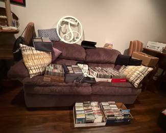 Loveseat and couch, dvds, cds, and vhs