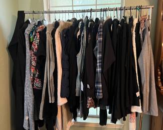 This rack is mostly coats and most of them have their original price tags