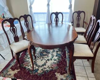 Beautiful Table comes with two leaves. Is in like new condition and six chairs. Four side chairs and two with arms