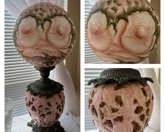 Very tall gone with the wind/hurricane lamp. It is unusual.. It has geode crystals on the bottom.