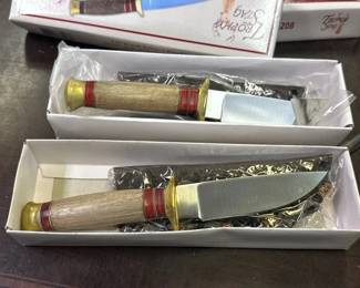 TWO TROPHY STAG KNIVES WITH SHEATHS