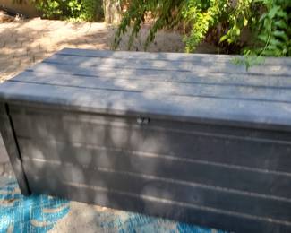 Patio storage bench. $5 outdoor rugs