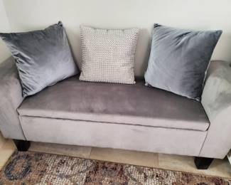 Low storage bench accent piece. Dove grey velour.