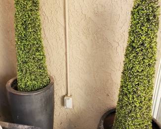 Black tall pots with faux topiary