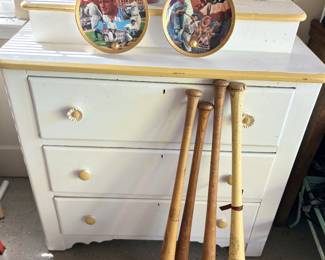 Vintage wood baseball bats, white furniture