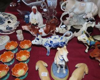 Collection of cows, Delft, Lladro, Germany, Japan, England, porcelain, bisque some are milk jugs some are ornaments. Noritake bowls,