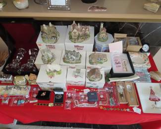 Collection of "Lilliput Lane" cottages, faux orchids, candle sticks, miniature clocks, jewelry and semi precious stones.