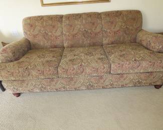 Paisley patterned comfy sofa and cushions.