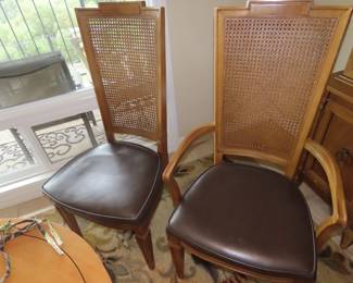 Dining table with 6 chairs, two extra leaves and table pads.
