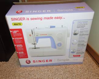 Like new Singer sewing machine.