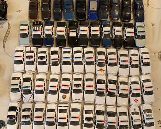 hundreds of scale1:43 police & Sheriff's cruisers