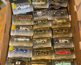 hundreds of scale1:64 police & Sheriff's cruisers & Other L.E. Vehicles