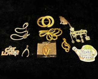 Gold And Silver Toned Brooches And Pins