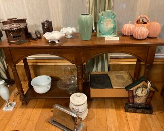 Beautiful sofa table… covered in antique treasures 
