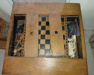 Chess table with 2 storage sections for player pieces.