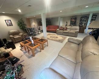another living room set - 2 couches and a recliner, all reclining , table set, sound system, radios, sound mixers,