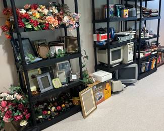 picture frames, computers, electronics, books, folders,