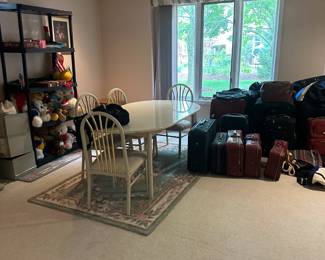 kitchen table set, travel bags and suite cases and board games