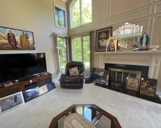 Icons, Christian pictures, flatscreen TV, powered leather recliner