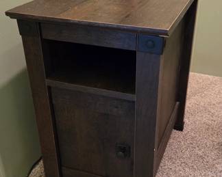 There are two of these side table, one door opens to the left and one opens to the right. Both have a slide out extension.