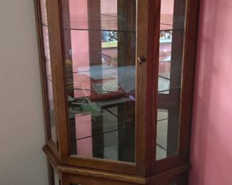 Corner glass cabinet
