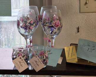 Hand painted wine glasses and votive candle holders.  Canadian