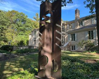 Side view of 'The Conductor' by Jay Lefkowitz. Corten Steel. 97"H x 37.5"W x 17'D