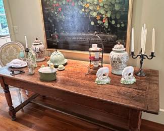 Refactory table with Chuck Wood's "And as the Flowers Grow" oil on canvas.