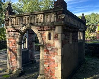 Opposite side view of neo-gothic folly based on a 17th century English model.