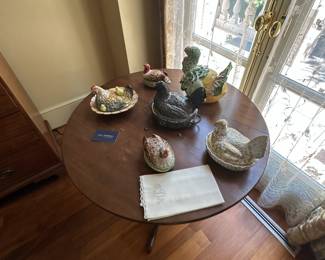 A selection of ceramic chickens