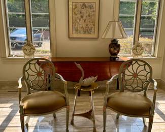 Pair of George III style green- painted wheel back open arm chairs