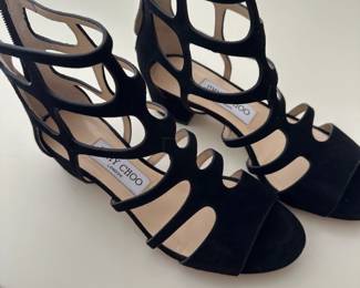 Detail of a pair of Jimmy Choo Black Suede Cage Sandals. Size 36. Barely worn. 