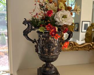 A pair of Napoleon III silvered and gilt-bronze double handled urns attributed to Christofle, circa 1860